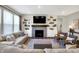 Bright living room features built-in shelving, fireplace, plush seating, and contemporary decor at 950 Edmonds Pl, Greenwood, IN 46143