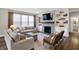 Inviting living room with fireplace, built-in shelves, and comfortable seating at 950 Edmonds Pl, Greenwood, IN 46143