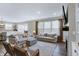 Spacious living room filled with natural light, comfortable seating, and hardwood floors at 950 Edmonds Pl, Greenwood, IN 46143