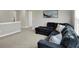 Comfortable loft space with sectional sofa, ideal for relaxing or entertaining at 950 Edmonds Pl, Greenwood, IN 46143