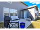 A well-appointed patio with seating area and sliding door access, perfect for outdoor relaxation at 950 Edmonds Pl, Greenwood, IN 46143