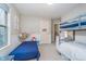 A bright bedroom with bunk beds, natural light, and a playful atmosphere at 10937 Sawgrass Dr, Fishers, IN 46037