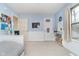 Bedroom with light blue walls, white trim, and plenty of natural light at 10937 Sawgrass Dr, Fishers, IN 46037
