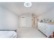 Bright bedroom with a bed, dresser, and doorway for easy access to other parts of the home at 10937 Sawgrass Dr, Fishers, IN 46037