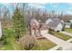 Charming brick two-story home with well-manicured lawn and attached two car garage at 10937 Sawgrass Dr, Fishers, IN 46037