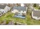 An aerial perspective of this home's deck, barbeque, hot tub, outdoor dining, and seating at 11046 Timberview Dr, Fishers, IN 46037