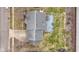 Overhead view of a well-maintained roof and a spacious deck with a fire pit feature at 11046 Timberview Dr, Fishers, IN 46037