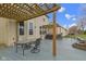 Enjoy outdoor dining on the back deck with its table, chairs, and covered pergola at 11046 Timberview Dr, Fishers, IN 46037
