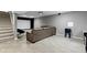 Finished basement features a movie area, couch, and staircase at 11046 Timberview Dr, Fishers, IN 46037