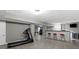 Finished basement with a workout area and bar, perfect for entertaining at 11046 Timberview Dr, Fishers, IN 46037