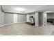 Finished basement includes a workout area with modern tile flooring at 11046 Timberview Dr, Fishers, IN 46037