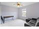 Bedroom with window letting in natural light with a small desk and futon at 11046 Timberview Dr, Fishers, IN 46037