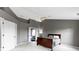 Spacious bedroom with neutral walls, plush carpet, and ample natural light at 11046 Timberview Dr, Fishers, IN 46037