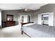Bright and airy main bedroom with large windows, ensuite bathroom, and walk in closet at 11046 Timberview Dr, Fishers, IN 46037