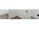 Bright utility room with wood-look floors and convenient hookups ready for appliances at 1255 Thornwood Dr, Greenwood, IN 46143