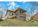 Charming backyard featuring a screened-in porch and a brick exterior at 12618 E 86Th St, Indianapolis, IN 46236