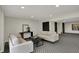 Finished basement featuring neutral couches, recessed lighting, and stylish decor at 12618 E 86Th St, Indianapolis, IN 46236