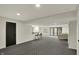 Finished basement with bar seating, recessed lighting, and sliding glass doors to the outside at 12618 E 86Th St, Indianapolis, IN 46236