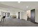 Spacious finished basement with gray patterned carpet, recessed lighting, and an open layout at 12618 E 86Th St, Indianapolis, IN 46236