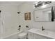 Stylish bathroom featuring a vanity, framed mirror, and combined shower with tub at 12618 E 86Th St, Indianapolis, IN 46236