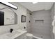 Modern bathroom with walk-in shower, gray tile, and stylish fixtures at 12618 E 86Th St, Indianapolis, IN 46236