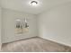 Bright bedroom featuring carpet floors and a window showcasing natural light at 12618 E 86Th St, Indianapolis, IN 46236