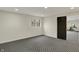 Comfortable bedroom with a modern door and a window letting in natural light at 12618 E 86Th St, Indianapolis, IN 46236