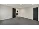Inviting bedroom featuring an adjacent room and modern black door at 12618 E 86Th St, Indianapolis, IN 46236