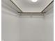 Uncluttered closet with natural wood bars ready for storage and organization at 12618 E 86Th St, Indianapolis, IN 46236