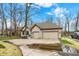 A beautiful single-Gathering home with an attached two-car garage, a spacious driveway, and mature trees at 12618 E 86Th St, Indianapolis, IN 46236
