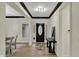 A welcoming entrance featuring an elegant door and views to the dining room at 12618 E 86Th St, Indianapolis, IN 46236