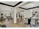 Open-concept living space featuring a cozy fireplace and stylish furniture at 12618 E 86Th St, Indianapolis, IN 46236