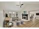 Bright living room with vaulted ceiling, fireplace, and plush seating at 12618 E 86Th St, Indianapolis, IN 46236