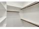Bright walk-in closet with ample shelving and hanging space for organization at 12618 E 86Th St, Indianapolis, IN 46236