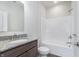 Bathroom featuring vanity with granite countertop and a shower/tub combo at 14539 Hanford Ln, Carmel, IN 46032