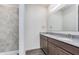 Bathroom with double vanity, granite countertop, and a tiled walk-in shower at 14539 Hanford Ln, Carmel, IN 46032