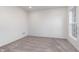 Bedroom with neutral color scheme, carpeting, and a bright window with outdoor views at 14539 Hanford Ln, Carmel, IN 46032