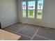 Bright living room area featuring large windows that flood the space with natural light at 14539 Hanford Ln, Carmel, IN 46032