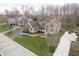 Stunning aerial view of a well-maintained property with lush green lawn and attractive landscaping at 14577 Faucet Ln, Fishers, IN 46040