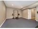Basement exercise area with carpet flooring and free weight equipment at 14577 Faucet Ln, Fishers, IN 46040