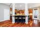 Open kitchen design featuring stainless steel appliances, a breakfast bar, and a view to the breakfast nook at 14577 Faucet Ln, Fishers, IN 46040