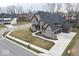 An aerial view showcasing the home's location on a corner lot with well-maintained landscaping at 14818 Autumn View Way, Fishers, IN 46037