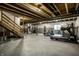 Spacious unfinished basement featuring concrete floors, exposed ceiling, and plenty of room for activities at 14818 Autumn View Way, Fishers, IN 46037