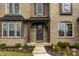 Close-up of the front door, showcasing the elegant design and welcoming entrance of the home at 14818 Autumn View Way, Fishers, IN 46037