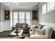 Comfortable living room showcasing neutral tones, stylish decor, and plenty of natural light at 14818 Autumn View Way, Fishers, IN 46037
