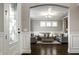Bright and airy living room with elegant furnishings and stylish decor, viewed from the doorway at 14818 Autumn View Way, Fishers, IN 46037