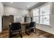 Well-lit office space with modern furnishings, including a large desk and ample storage at 14818 Autumn View Way, Fishers, IN 46037