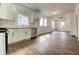 Bright kitchen with white cabinets, wood countertops, stainless steel appliances, and wood floor at 1518 Lawton Ave, Indianapolis, IN 46203