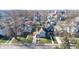 Aerial view of the home showcasing its location within a residential neighborhood with mature trees at 1521 Pleasant St, Indianapolis, IN 46203