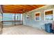 Covered back porch with brick flooring and wood ceiling at 1521 Pleasant St, Indianapolis, IN 46203